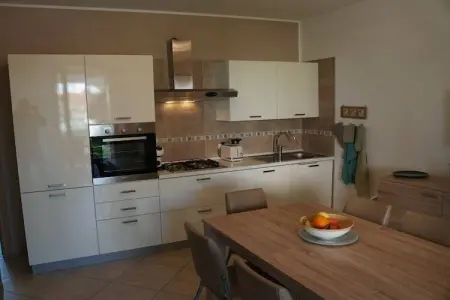 Appartement neuf 2 chambres avec terrasse couverte à Lazise : photo 12