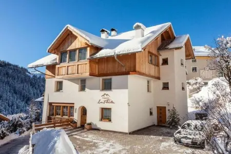 Appartement neuf à Wengen avec balcon sud et navette ski : photo 1