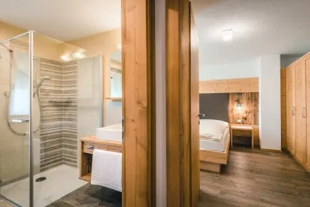 Appartement neuf à Wengen avec balcon sud et navette ski : photo 15