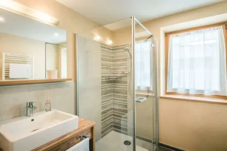 Appartement neuf à Wengen avec balcon sud et navette ski : photo 17