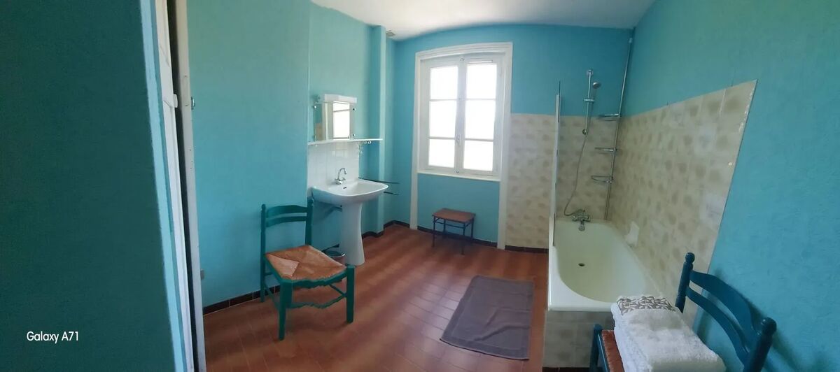 Appartement 90 m² avec jardin clos et cheminée à Noirétable - Photo 12