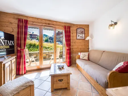 Appartement spacieux avec terrasse et piscine, Appartement 4 personnes à Les Menuires : photo 1