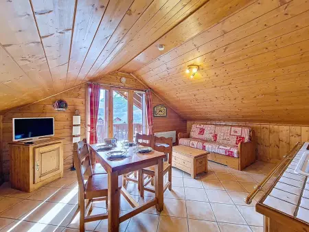 Appartement mansardé skis aux pieds aux Menuires, balcon et piscine : photo 1