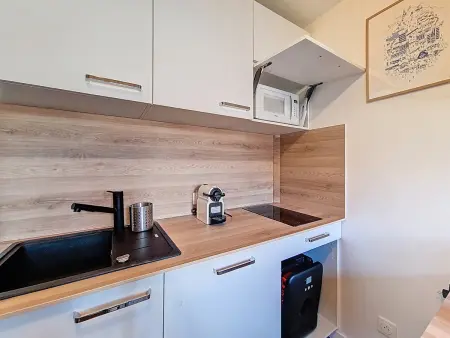 Studio rénové pied des pistes Les Menuires, WiFi et ascenseur : photo 3