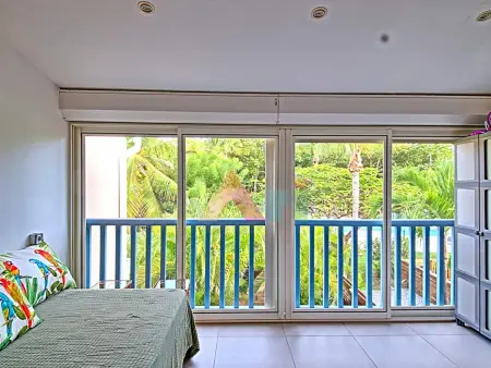 Duplex avec piscine partagée et jardin tropical à Saint-Martin : photo 11