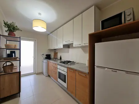 Appartement climatisé avec patio et piscine à Tavira, Portugal : photo 15