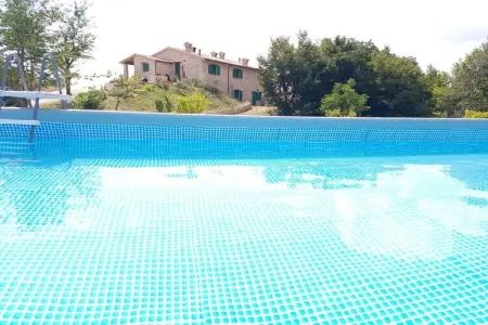 Maison de vacances à Cagli : 3 chambres, 2 salles de bains et jardin : photo 1