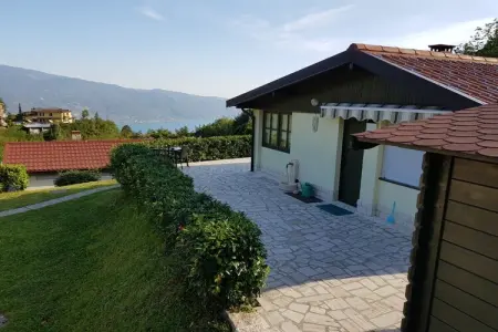 536421, Maison de vacances à Tignale avec piscine : photo 2