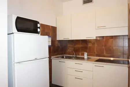 Maison de vacances à Caorle : 1 chambre, climatisation et balcon : photo 8