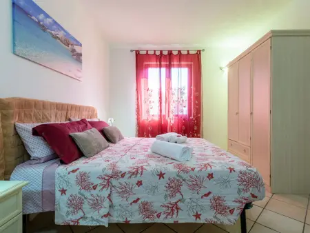 Appartement Il Giardino di Sabrina avec jardin à Valledoria : photo 11