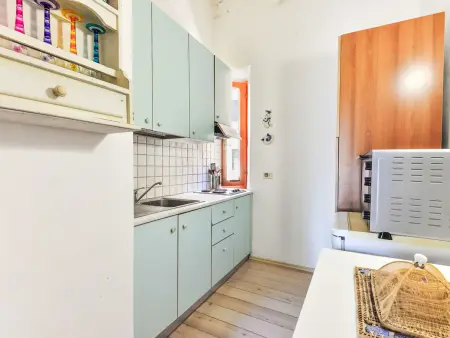 IL Borgo Cavour : appartement sous les toits vue rivière à Capoliveri : photo 5