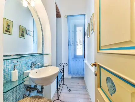 IL Borgo Cavour : appartement sous les toits vue rivière à Capoliveri : photo 7