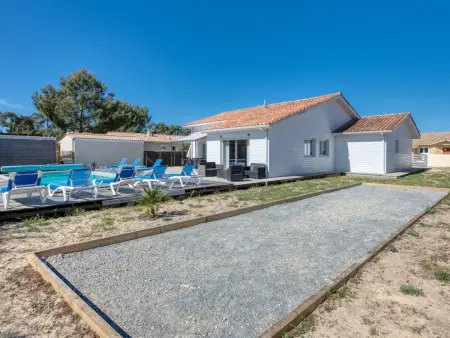 Villa Nael à Montalivet avec piscine chauffée et terrain clôturé : photo 6