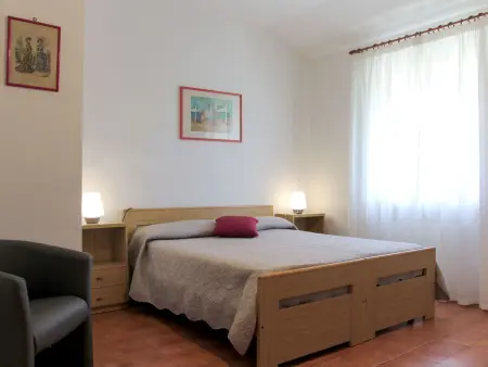 Appartement Le Rasole à Garda, terrasse couverte et vue piscine : photo 8