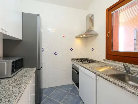 Maison de 100 m² à Costa Rei avec terrasse couverte : photo 12