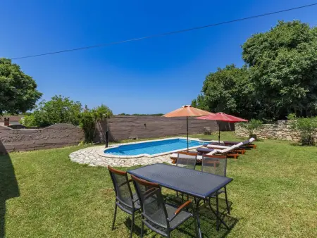 Maison Laura à Pula : piscine privée et terrain 800m² : photo 2