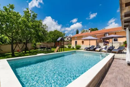 Location maison de vacances à Žminj