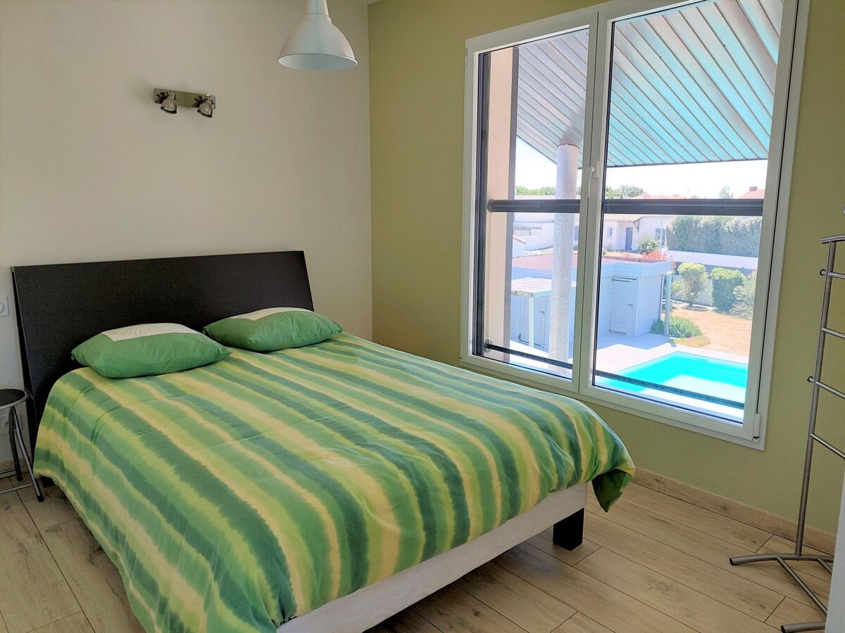 Appartement Les Epinettes – piscine chauffée à Givrand - Photo 7