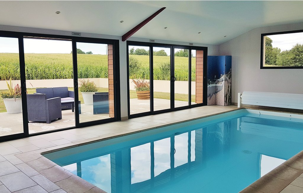 Grange rénovée avec piscine couverte à Elliant - Photo 1