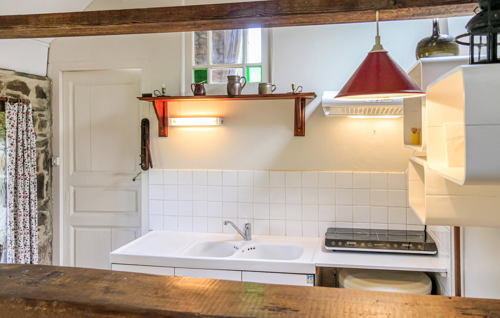 Maison rustique en pierre avec jardin à Quettehou - Photo 4