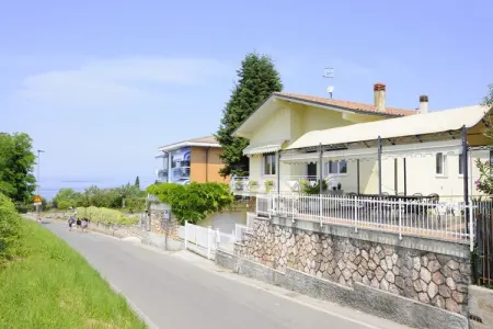 Location maison à Lazise, Maison de Vacances au Lac de Garde Jardin
