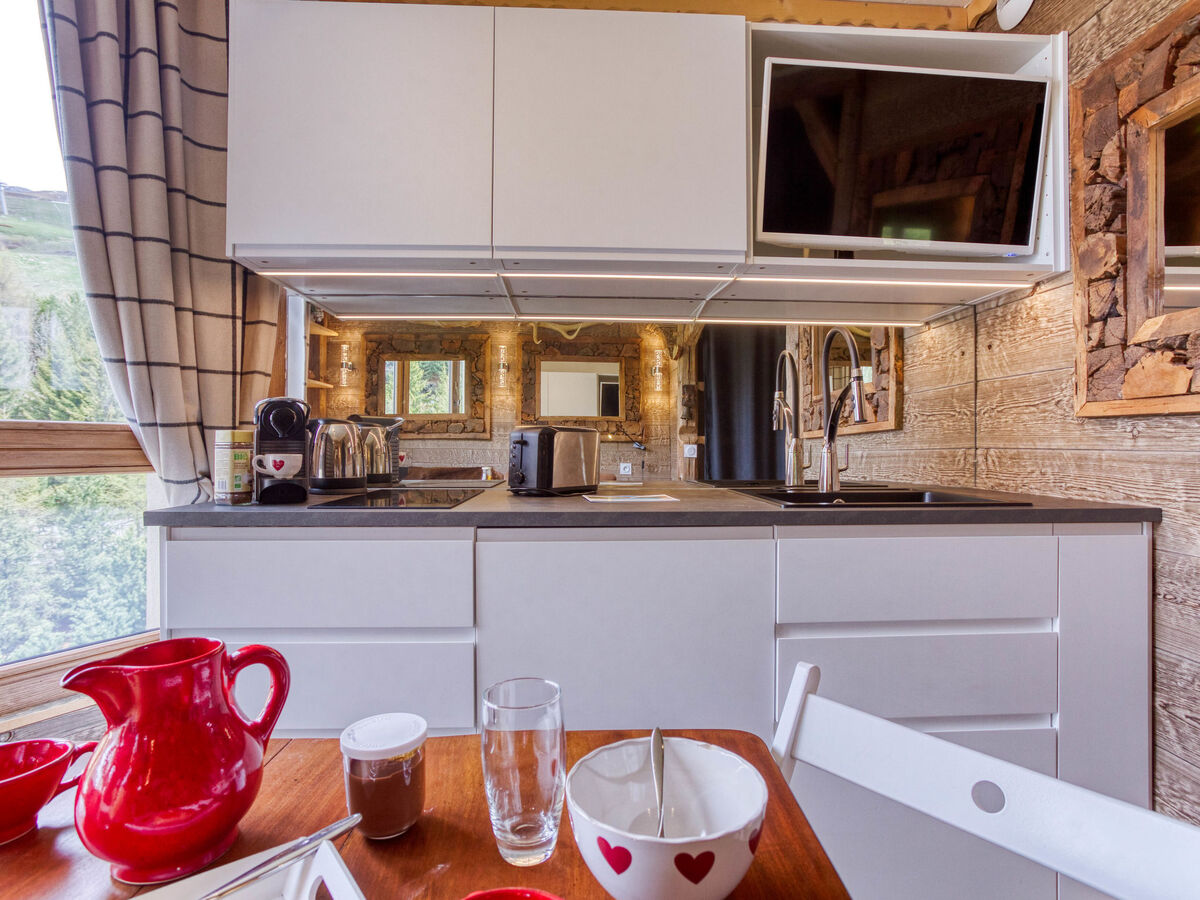 Studio rénové aux Ménuires, 14e étage, vue vallée - Photo 11