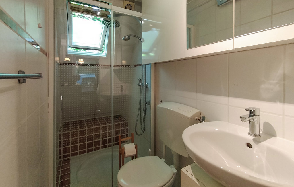 Maison 60 m² dans parc de vacances avec poêle à bois - Photo 12