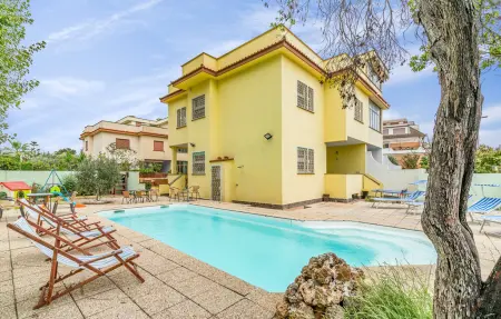 Location maison de vacances à Torvaianica