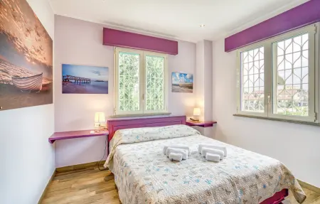 Location Maison 9 personnes à Torvaianica - Photo 12
