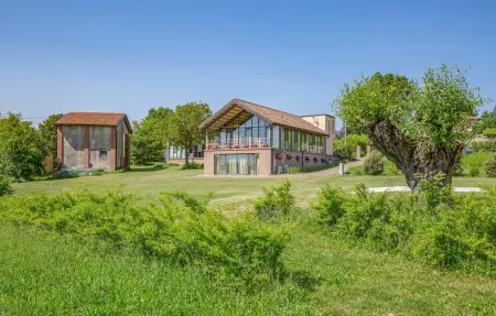 Maison 27 pers. à Fortunago : piscine, sauna et 3 salons : photo 14