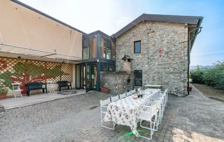 Maison 27 pers. à Fortunago : piscine, sauna et 3 salons : photo 16