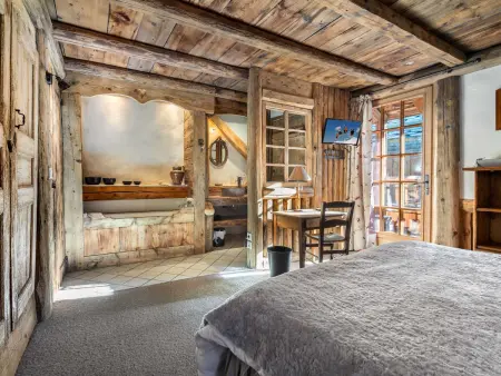 Chalet authentique avec jacuzzi, sauna et parking pour 12 personnes - Photo 10