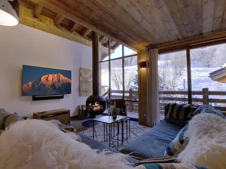 Location chalet à Méribel, Chalet élégant 4* à Méribel, proche télécabine Olympe, 4 chambres, dortoir, hammam et cheminée
