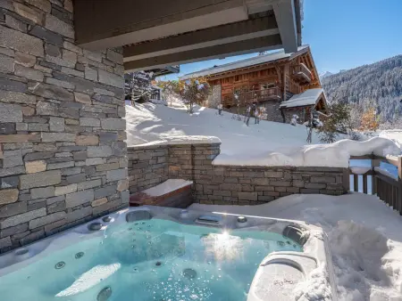 Chalet de luxe à Courchevel avec jacuzzi et cheminée : photo 12