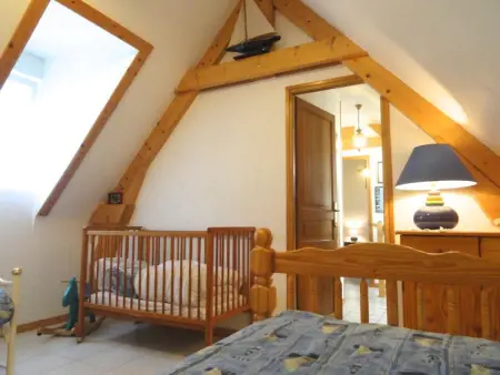 Gîte en pierre avec cheminée et jardin clos à Surtainville : photo 10