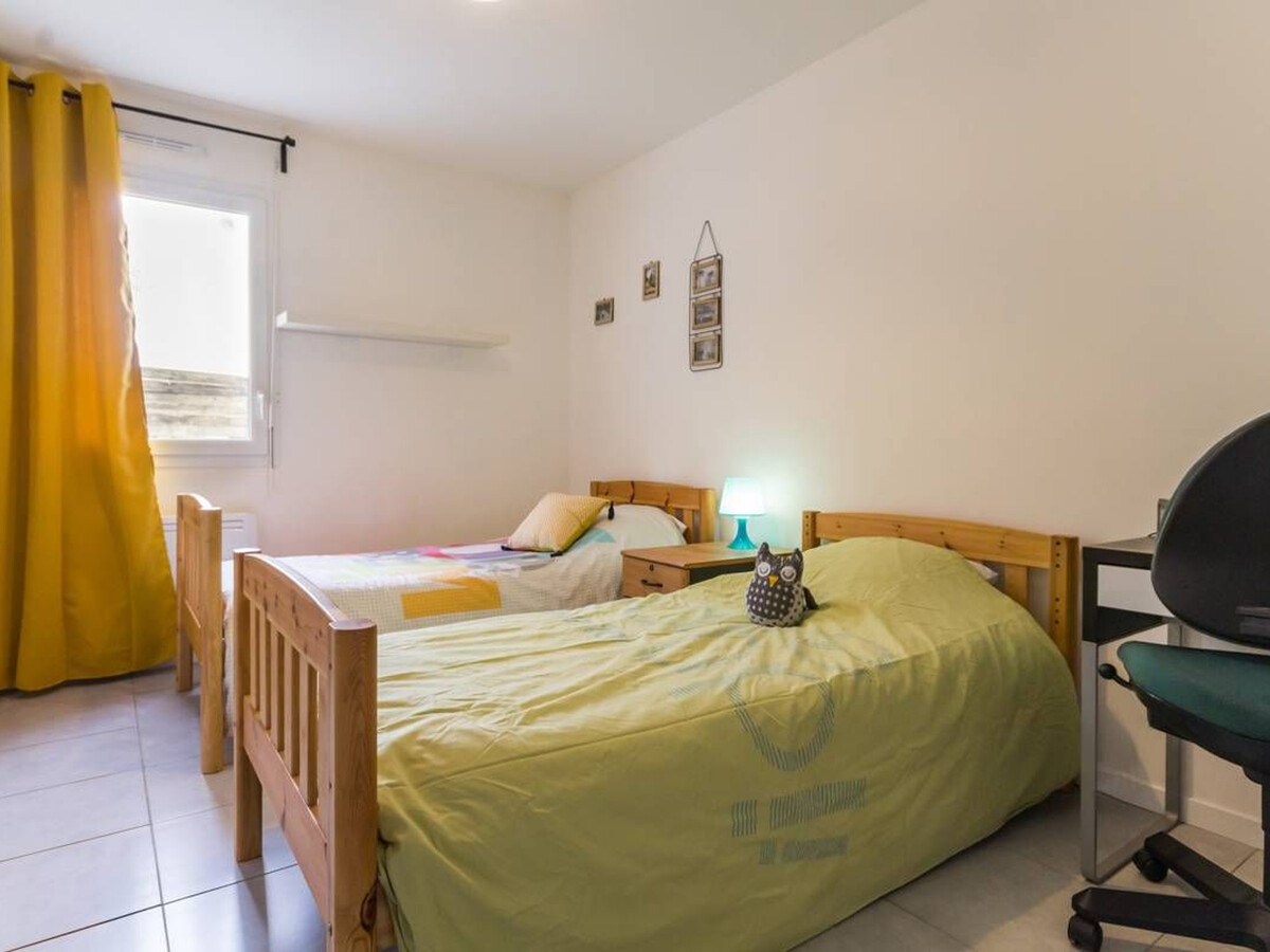 Maison contemporaine plain-pied à Nozay, 3 ch., jardin 700 m² - Photo 6