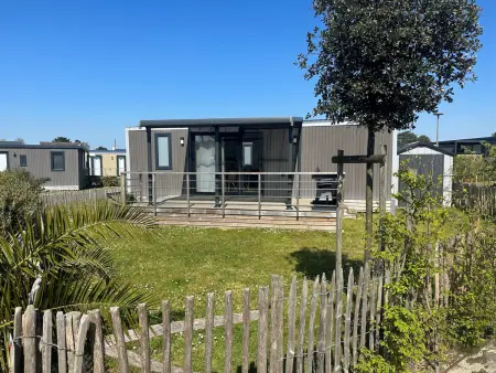 Location mobil home à Jullouville, Mobil-home 6 pers, 3 chambres, piscine chauffée, plage à 200m, terrasse couverte