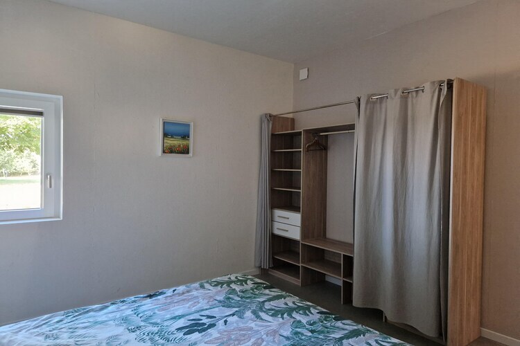 Maison plain-pied éco-conçue, jardin 3000 m², vue mer - Photo 11