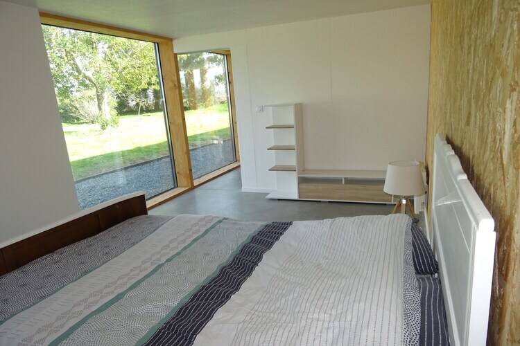 Maison plain-pied éco-conçue, jardin 3000 m², vue mer - Photo 12