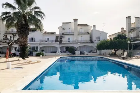 Location maison à Orihuela, Charmante maison de vacances avec piscine communautaire