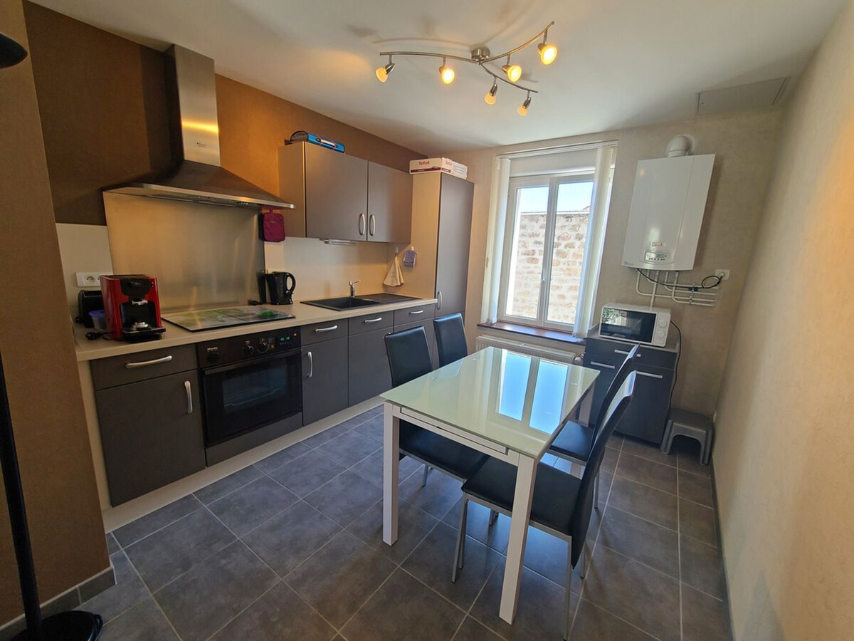 T2 rénové plain-pied avec cour privée à Épinal - Photo 8