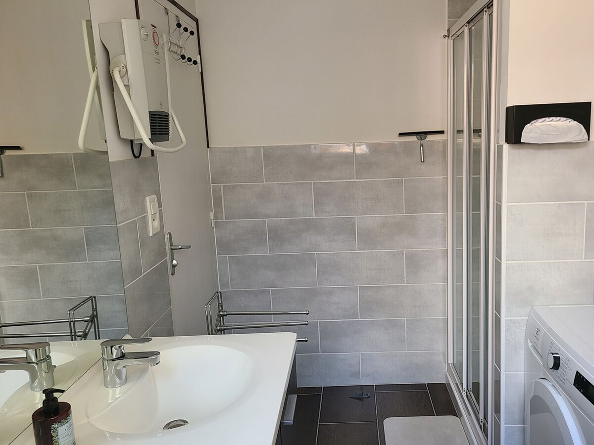T2 rénové plain-pied avec cour privée à Épinal - Photo 14
