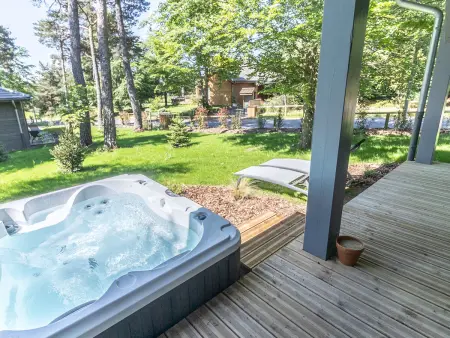 Lodge Bellecombe au golf du Chambon avec bain à remous : photo 10