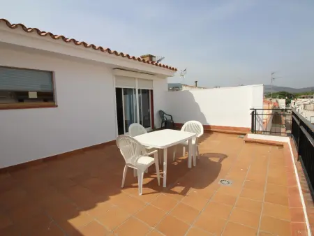 Location appartement à Llançà, Penthouse central avec grande terrasse à 100m de la plage et WIFI