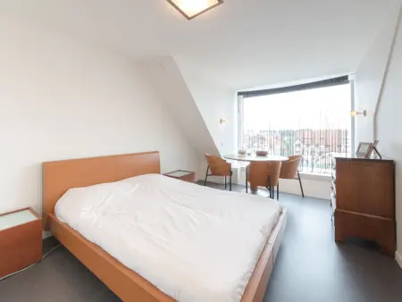 Duplex turquoise avec balcon et vue sur la ville, De Haan : photo 4