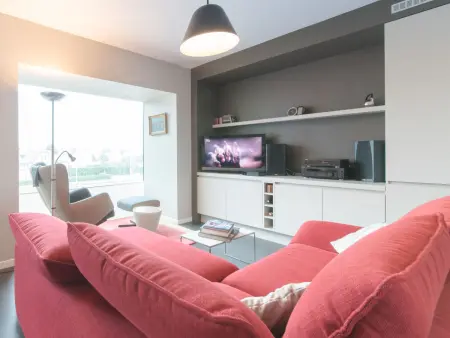Duplex turquoise avec balcon et vue sur la ville, De Haan : photo 8