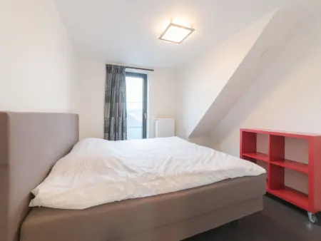 Duplex turquoise avec balcon et vue sur la ville, De Haan : photo 9
