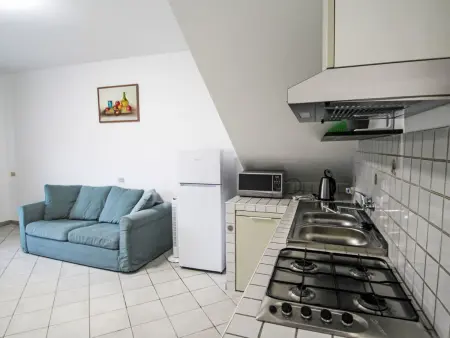 Residenza Agrifoglio - Apt 2 pièces avec jardin et piscine : photo 9