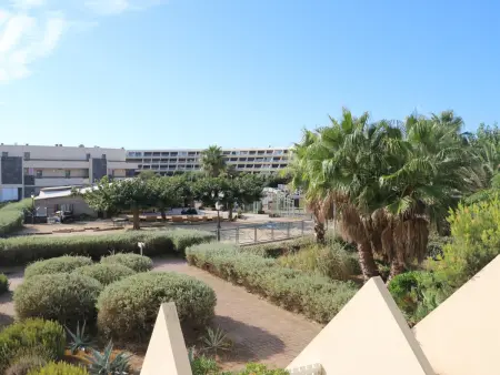 Location appartement à Cap d'Agde naturisme, Studio climatisé à Agde avec terrasse, wifi et équipements modernes, proche de la plage et des commodités