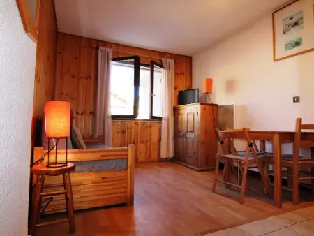 Location appartement à Huez, Studio cosy pour 4 pers., pied des pistes Alpe dHuez, centre-station, TV, cuisine équipée, casier à skis